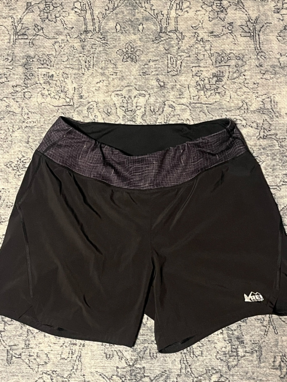 REI athletic shorts with back zipper for storage